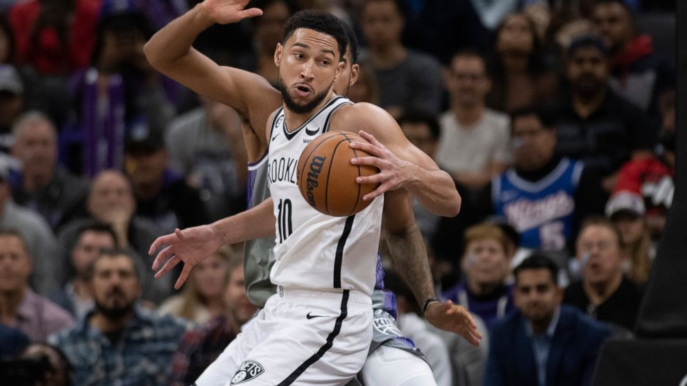 Brooklyn Nets guard Ben Simmons (10) makes a spin move in the key in the second half of an NBA basketball game against the Sacramento Kings in Sacramento, Calif., Tuesday, Nov. 15, 2022. The Kings won 153-121. (AP Photo/José Luis Villegas)