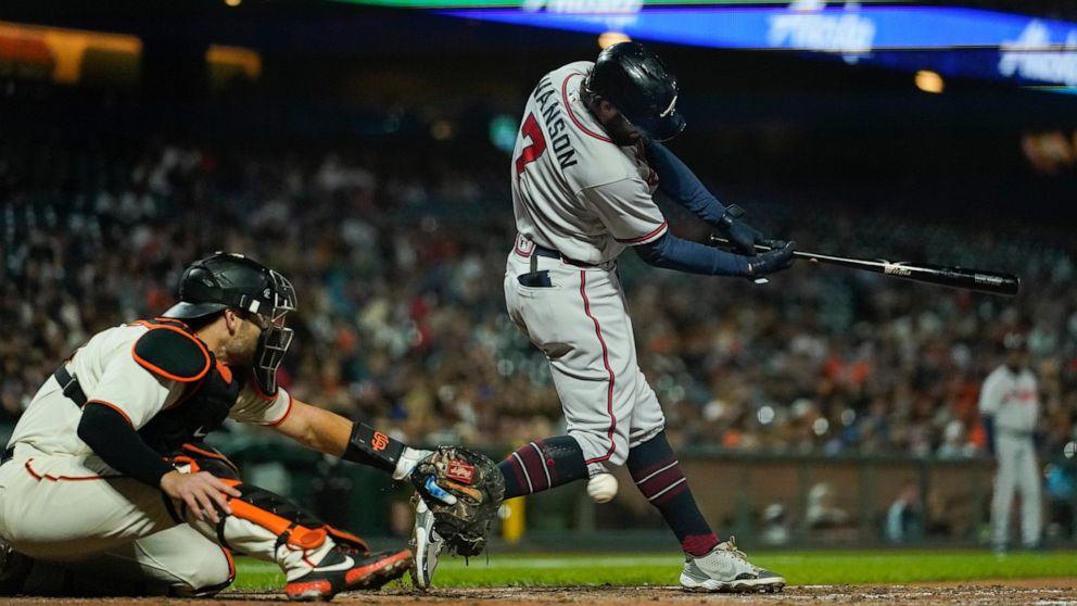 Atlanta Braves' Dansby Swanson (7) strikes out against the San Francisco Giants during the sixth inning of a baseball game in San Francisco, Monday, Sept. 12, 2022. (AP Photo/Godofredo A. Vásquez)