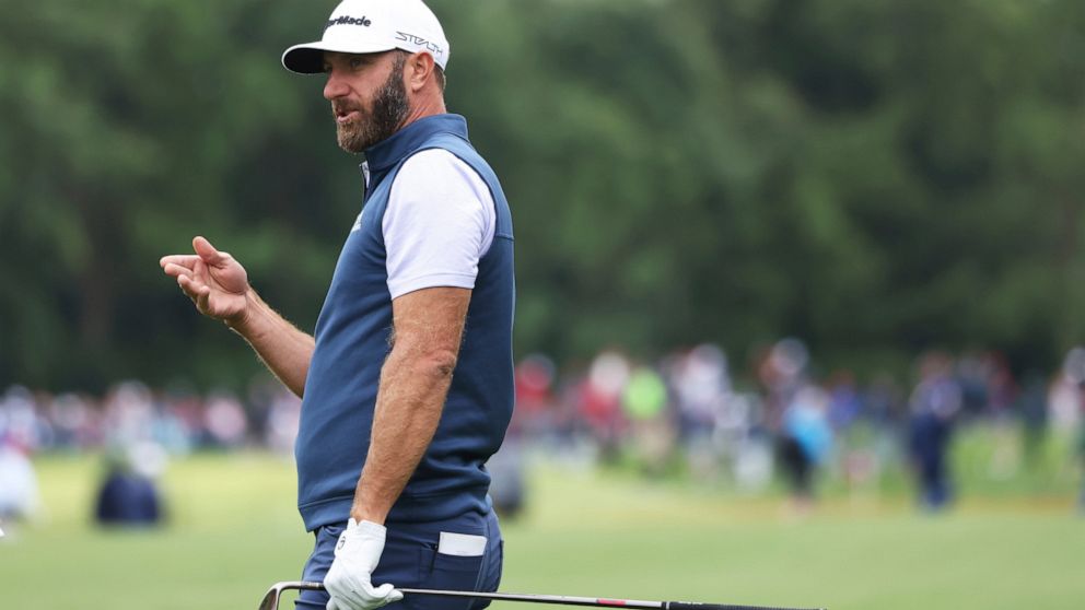 U.S golfer Dustin Johnson after playing his second shot on the 4th hole during the JP McManus Pro-Am at Adare Manor, in Limerick, Ireland, Monday, July, 4, 2022. (AP Photo/Peter Morrison)