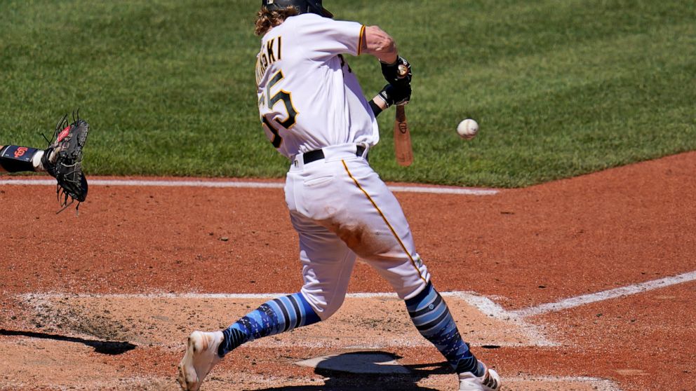 Pittsburgh Pirates' Jack Suwinski hits a solo home run off San Francisco Giants relief pitcher Sam Long during the sixth inning of a baseball game in Pittsburgh, Sunday, June 19, 2022. It was Suwinski's second solo home run of the game. (AP Photo/Gen