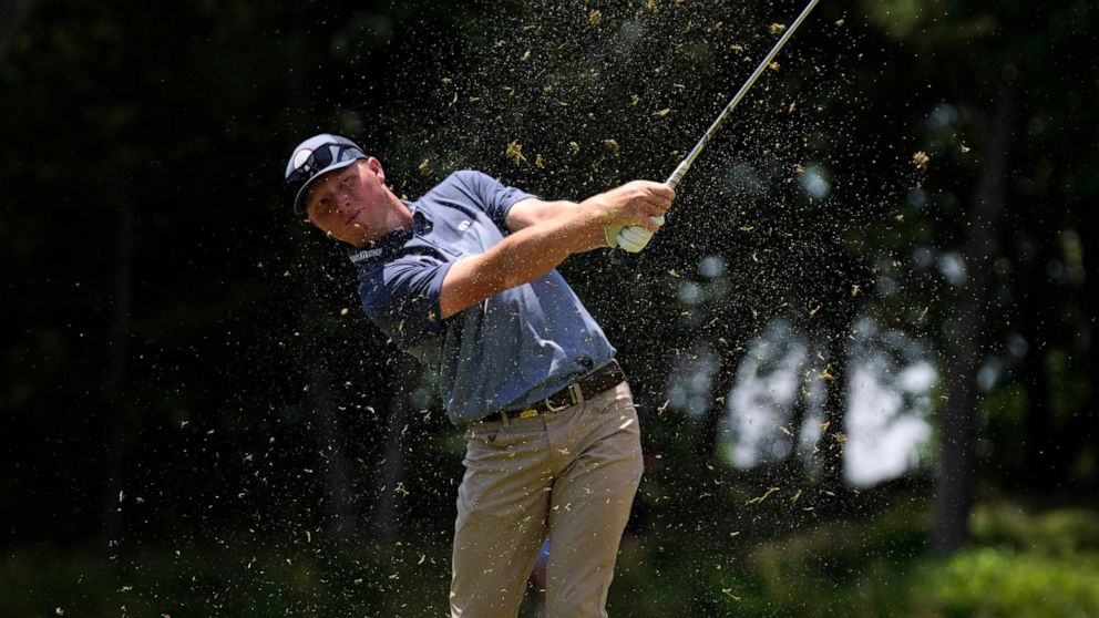 Travis Vick hits on the 11th hole during the second round of the U.S. Open golf tournament at The Country Club, Friday, June 17, 2022, in Brookline, Mass. (AP Photo/Robert F. Bukaty)