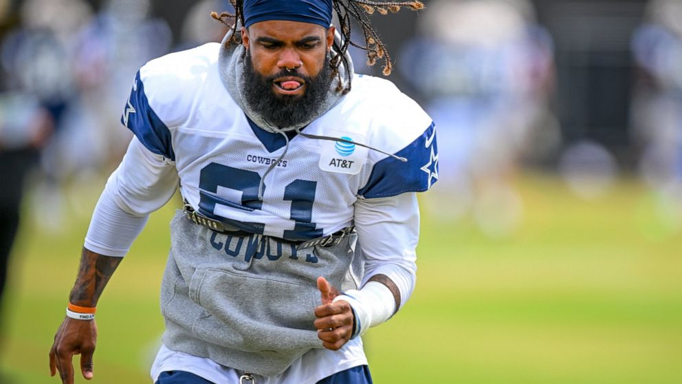Dallas Cowboys running back Ezekiel Elliott runs a conditioning exercise at NFL football training camp, Monday, Aug. 1, 2022, in Oxnard, Calif. (AP Photo/Gus Ruelas)