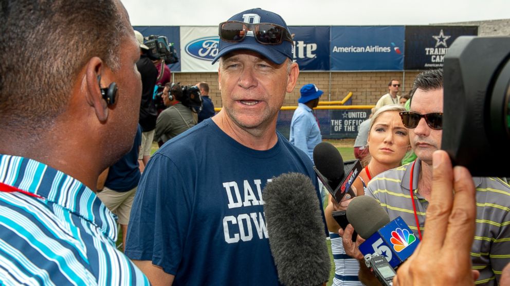 FILE - In this July 28, 2018, file photo, Dallas Cowboys offensive coordinator Scott Linehan talks with the media after morning practice at NFL football training camp, in Oxnard, Calif. Scott Linehan is out as offensive coordinator of the Dallas Cowb