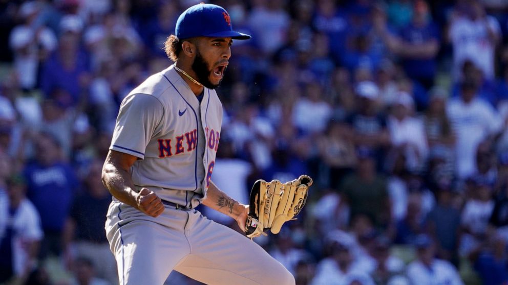 New York Mets relief pitcher Adonis Medina celebrates after striking out Los Angeles Dodgers' Will Smith to end the game in the 10th inning of a baseball game Sunday, June 5, 2022, in Los Angeles. The Mets won 5-4. (AP Photo/Mark J. Terrill)