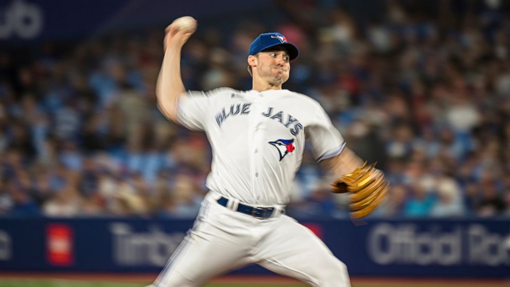 Toronto Blue Jays starting pitcher Ross Stripling (48) throws during second inning of a baseball game against the Baltimore Orioles, in Toronto on Wednesday, Aug. 17, 2022. (Christopher Katsarov/The Canadian Press via AP)