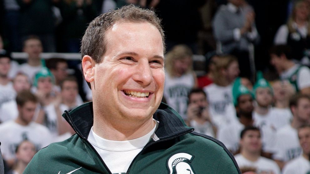 FILE -Former Michigan State player Mat Ishbia laughs as he are introduced along with Michigan State's 2000 national championship NCAA college basketball team during halftime of the Michigan State-Florida game in East Lansing, Mich. Mortgage executive
