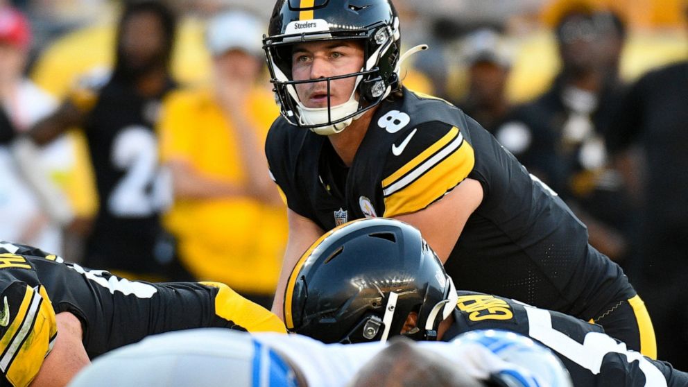 Pittsburgh Steelers quarterback Kenny Pickett (8) call signals at the line of scrimmage as he plays against the Detroit Lions during the second half of an NFL preseason football game, Sunday, Aug. 28, 2022, in Pittsburgh. (AP Photo/Don Wright)