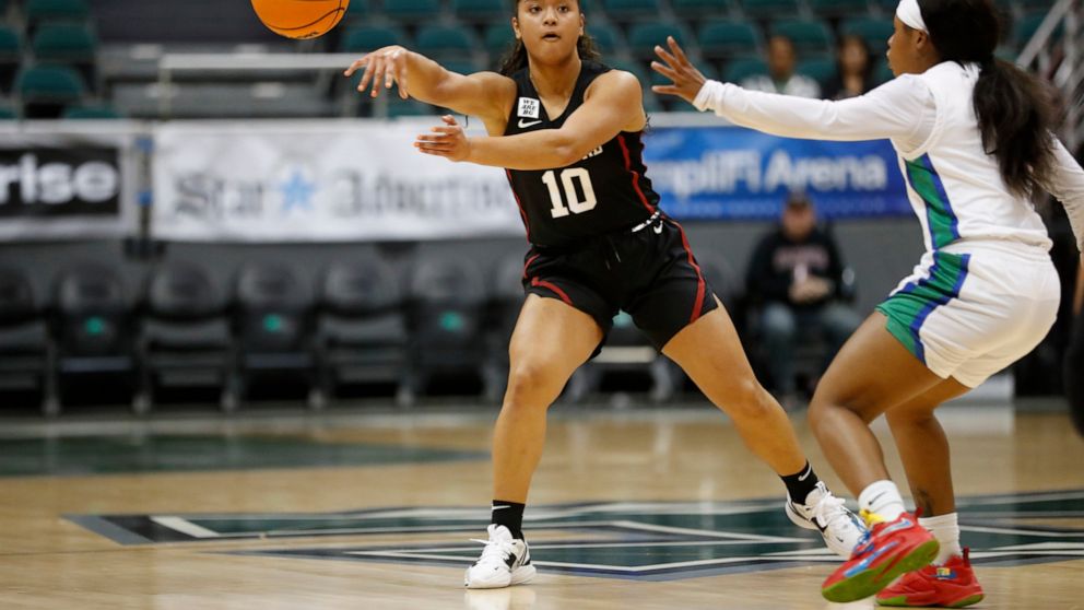 Stanford guard Talana Lepolo (10) passes the ball against Florida Gulf Coast during the first quarter of an NCAA college basketball game, Friday, Nov. 25, 2022, in Honolulu. (AP Photo/Marco Garcia)