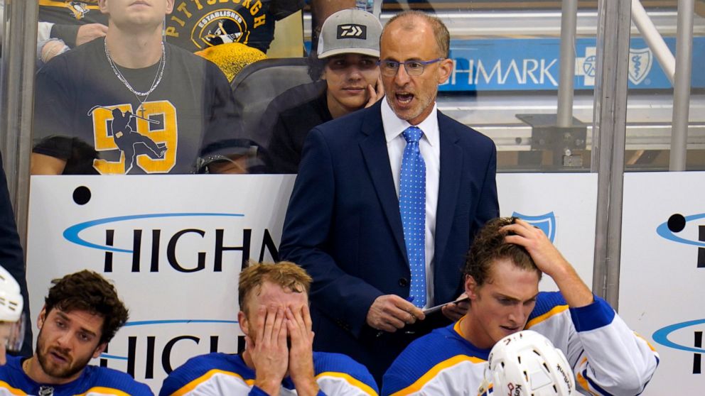FILE - Buffalo Sabres head coach Don Granato gives instructions during the third period of a preseason NHL hockey game against the Pittsburgh Penguins in Pittsburgh, on Oct. 5, 2021. With Jack Eichel gone, along with the offseason departures of forwa