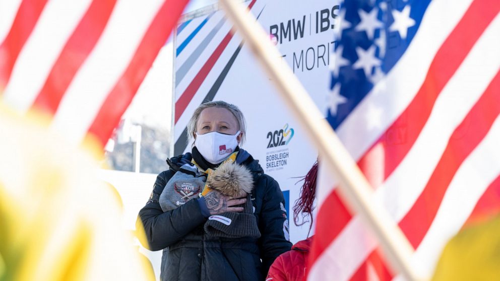 Winner Kaillie Humphries of USA on the podium after the Women's Monobob World Cup in St. Moritz, Switzerland, on Saturday, Jan. 15, 2022. (Mayk Wendt)/Keystone via AP)