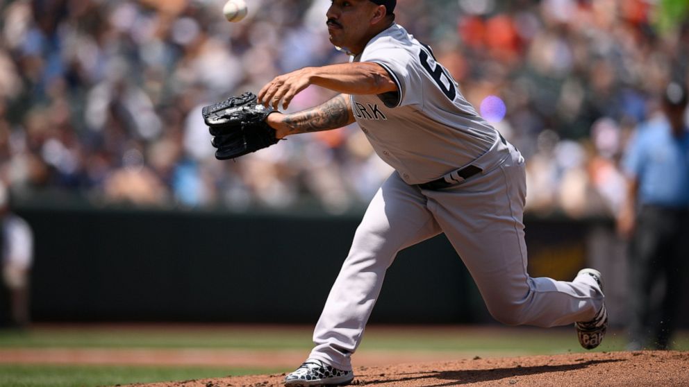 New York Yankees starting pitcher Nestor Cortes throws during the first inning of a baseball game against the Baltimore Orioles, Sunday, July 24, 2022, in Baltimore. (AP Photo/Nick Wass)