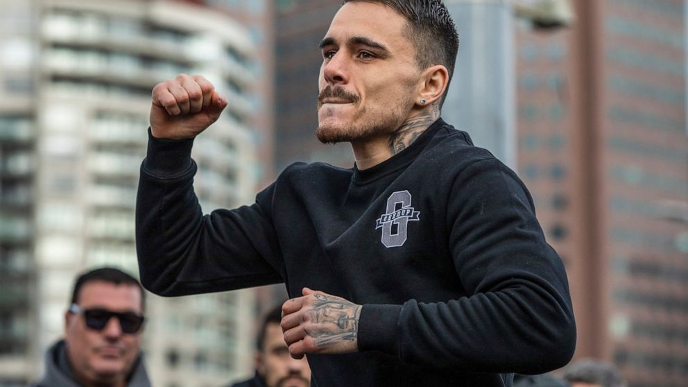 Australian boxer George Kambosos gestures during a public training session at Federation Square in Melbourne, Australia, Thursday, June 2, 2022. U.S.-based Australian boxer Kambosos will put his WBA, IBF and WBO belts on the line on Sunday at Melbour