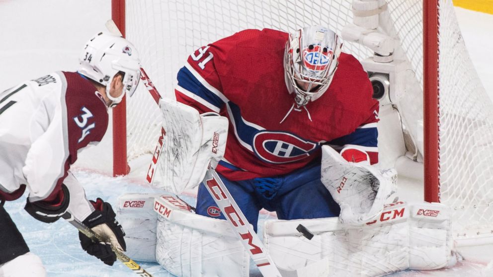 Montreal Canadiens goaltender Carey Price makes a save against Colorado Avalanche's Carl Soderberg during the first period of an NHL hockey game Saturday, Jan. 12, 2019, in Montreal. (Graham Hughes/The Canadian Press via AP)