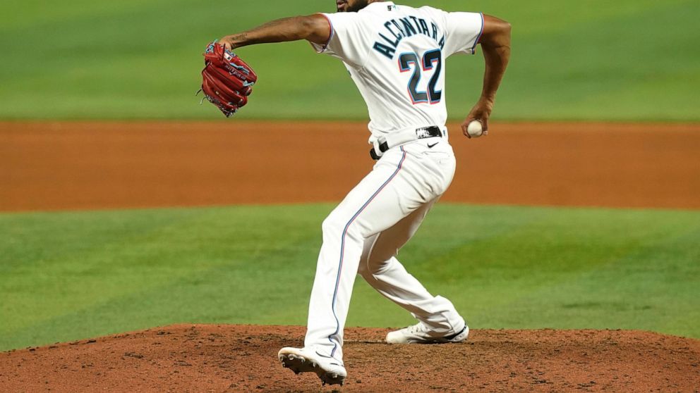 Miami Marlins starting pitcher Sandy Alcantara aims a pitch in the seventh inning of a baseball game against the San Diego Padres, Monday, Aug. 15, 2022, in Miami. (AP Photo/Marta Lavandier)
