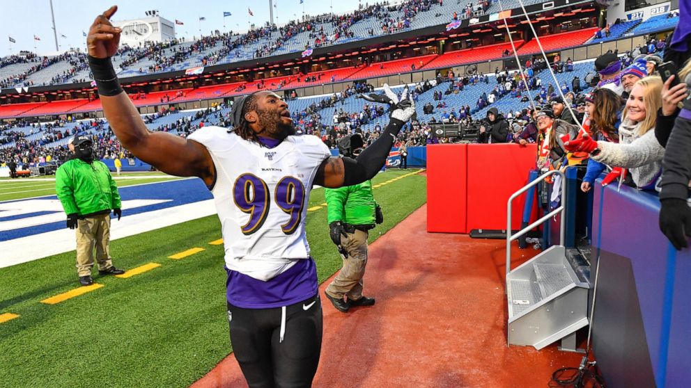 Baltimore Ravens outside linebacker Matt Judon (99) celebrates a 24-17 win over the Buffalo Bills after an NFL football game in Orchard Park, N.Y., Sunday, Dec. 8, 2019. (AP Photo/Adrian Kraus)
