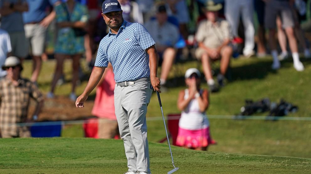 J.J. Spaun watches his putt on the 18th green during the third round of the St. Jude Championship golf tournament, Saturday, Aug. 13, 2022, in Memphis, Tenn. (AP Photo/Mark Humphrey