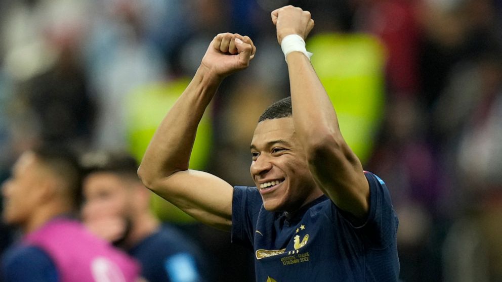 France's Kylian Mbappe celebrates at the end of the World Cup quarterfinal soccer match between England and France, at the Al Bayt Stadium in Al Khor, Qatar, Sunday, Dec. 11, 2022. France won 2-1. (AP Photo/Francisco Seco)