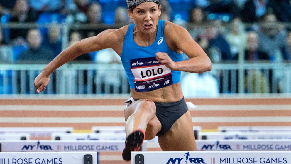 FILE - In this Feb. 3, 2018, file photo, Lolo Jones, of the United States, competes in the Howard Schmertz women's 60-meter hurdles at the Millrose Games track and field meet in New York. After competing in two Summer Olympics as a hurdler and one Wi