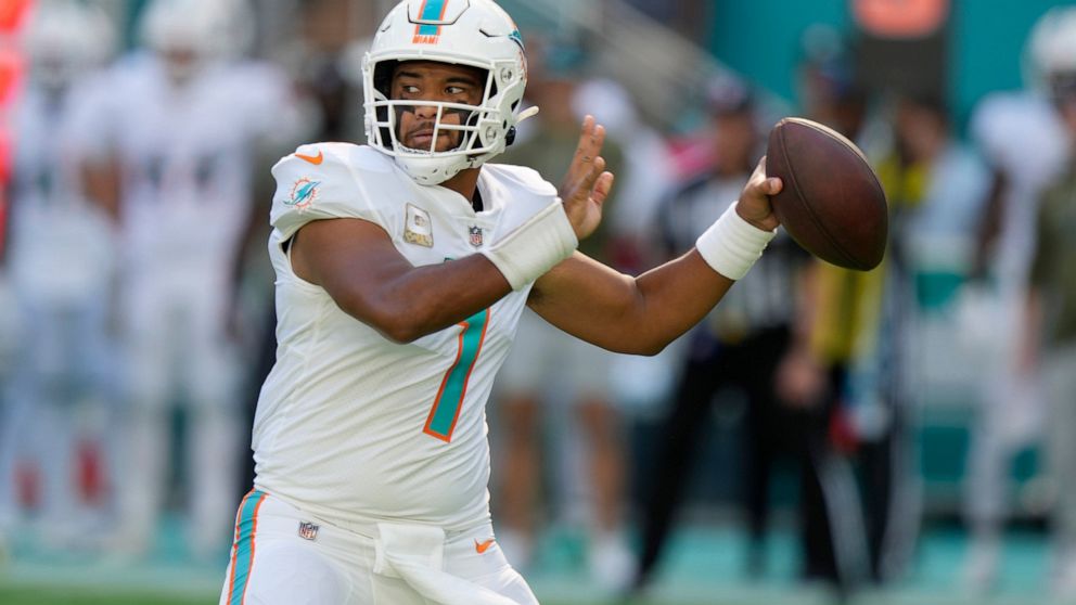 Miami Dolphins quarterback Tua Tagovailoa (1) aims the ball during the first half of an NFL football game against the Cleveland Browns, Sunday, Nov. 13, 2022, in Miami Gardens, Fla. (AP Photo/Lynne Sladky)