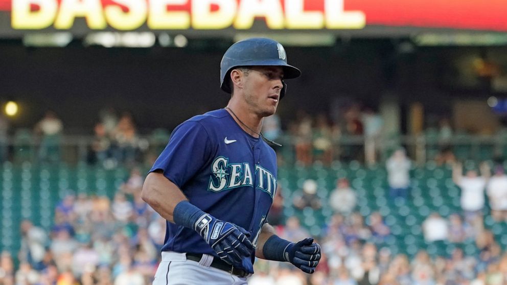 Seattle Mariners' Dylan Moore rounds the bases after hitting a solo home run against the Toronto Blue Jays during the second inning of a baseball game, Thursday, July 7, 2022, in Seattle. (AP Photo/Ted S. Warren)