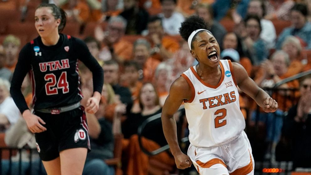 Texas guard Aliyah Matharu (2) celebrates a play as she runs past Utah guard Kennady McQueen (24) during the second half of a college basketball game in the second round of the NCAA women's tournament, Sunday, March 20, 2022, in Austin, Texas. (AP Ph