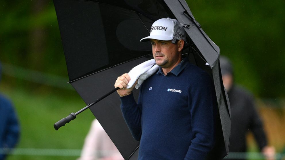 Keegan Bradley watches between shots on the seventh green during the third round of the Wells Fargo Championship golf tournament, Saturday, May 7, 2022, at TPC Potomac at Avenel Farm golf club in Potomac, Md. (AP Photo/Nick Wass)