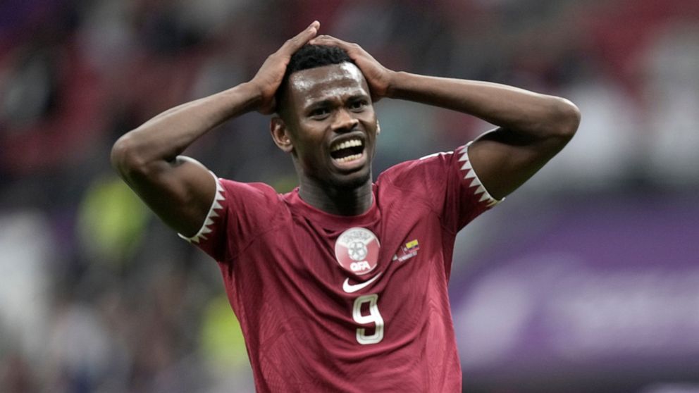 Qatar's Mohammed Muntari reacts after missing a chance to score during the World Cup, group A soccer match between Qatar and Ecuador at the Al Bayt Stadium in Al Khor, Sunday, Nov. 20, 2022. (AP Photo/Ariel Schalit)