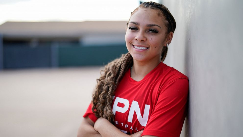 La Jolla Country Day high school basketball player Jada Williams poses for a portrait Monday, Sept. 12, 2022, in San Diego. Jada Williams has been a fixture on social media since she was 11 and stands out because of her flair for engagement. With the