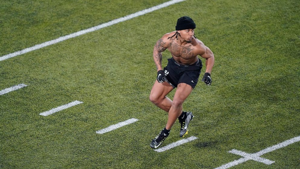 FILE - LSU cornerback Derek Stingley Jr. runs through drills during the school's football pro day in Baton Rouge, La., April 6, 2022. If Stintley cracks the top 10, LSU will join Texas and Ohio State as the only colleges with five top 10 defensive ba