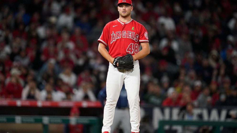 Los Angeles Angels starting pitcher Reid Detmers (48) stands on the mound during the seventh inning of a baseball game against the Tampa Bay Rays in Anaheim, Calif., Tuesday, May 10, 2022. (AP Photo/Ashley Landis)