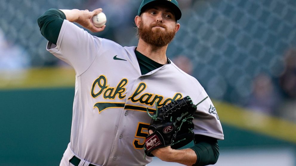 Oakland Athletics pitcher Paul Blackburn throws against the Detroit Tigers in the first inning of a baseball game in Detroit, Monday, May 9, 2022. (AP Photo/Paul Sancya)