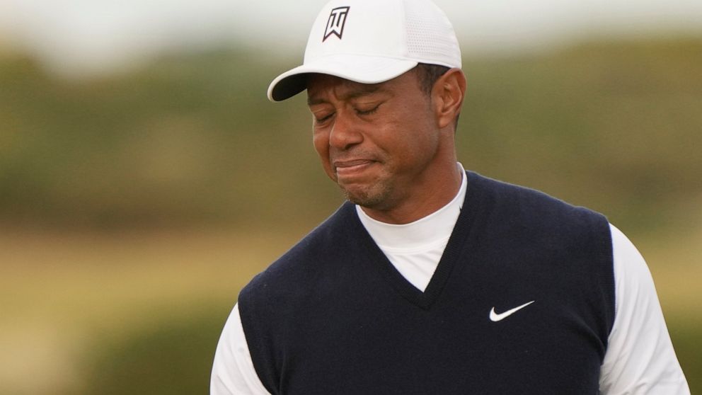 Tiger Woods of the US after putting on the 11th green during the first round of the British Open golf championship on the Old Course at St. Andrews, Scotland, Thursday July 14, 2022. The Open Championship returns to the home of golf on July 14-17, 20