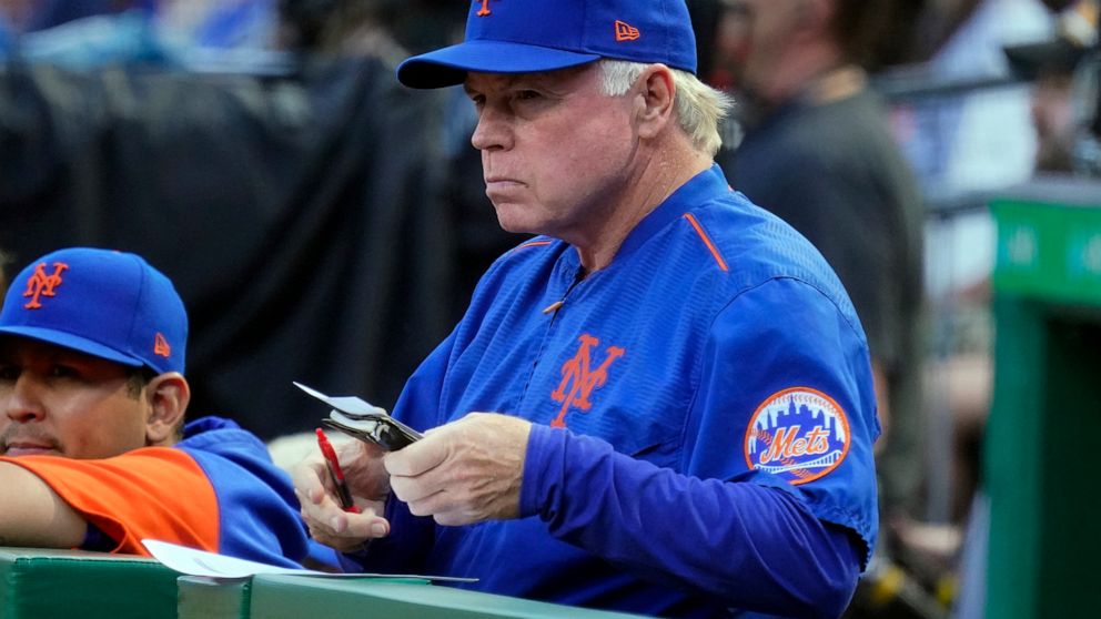 New York Mets manager Buck Showalter stands in the dugout during the second inning of the team's baseball game against the Pittsburgh Pirates in Pittsburgh, Tuesday, Sept. 6, 2022. (AP Photo/Gene J. Puskar)