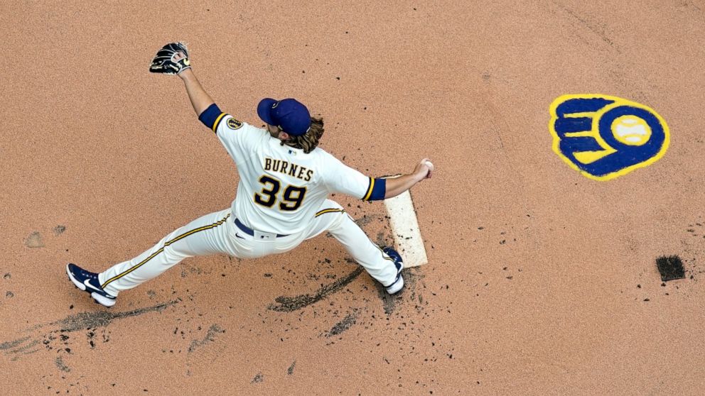 Milwaukee Brewers starting pitcher Corbin Burnes throws during the first inning of game 1 of a doubleheader baseball game against the San Francisco Giants Thursday, Sept. 8, 2022, in Milwaukee. (AP Photo/Morry Gash)