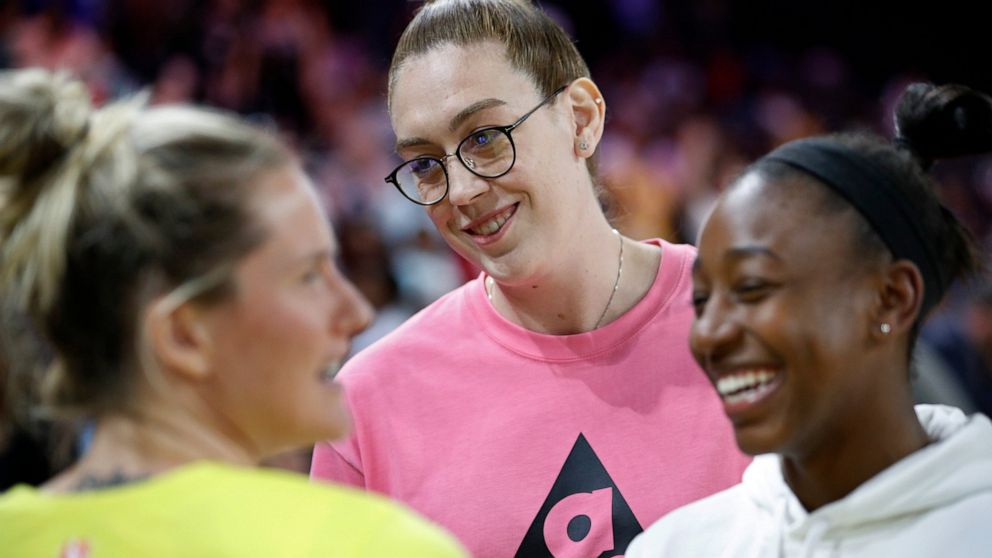 Seattle Storm's Breanna Stewart, center, attends the WNBA All-Star festivities Friday, July 26, 2019, in Las Vegas. (AP Photo/John Locher)