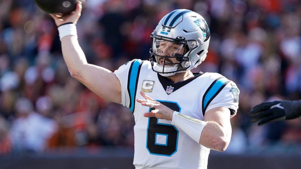 Carolina Panthers quarterback Baker Mayfield (6) looks to pass against the Cincinnati Bengals during the second half of an NFL football game, Sunday, Nov. 6, 2022, in Cincinnati. (AP Photo/Joshua A. Bickel)