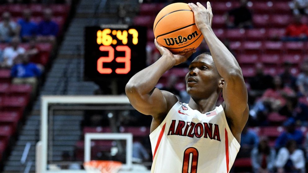 FILE - Arizona guard Bennedict Mathurin (0) shoots against Wright State during the first half of a first-round NCAA college basketball tournament game on March 18, 2022, in San Diego. Mathurin is a lottery prospect and one of the top wings in this ye