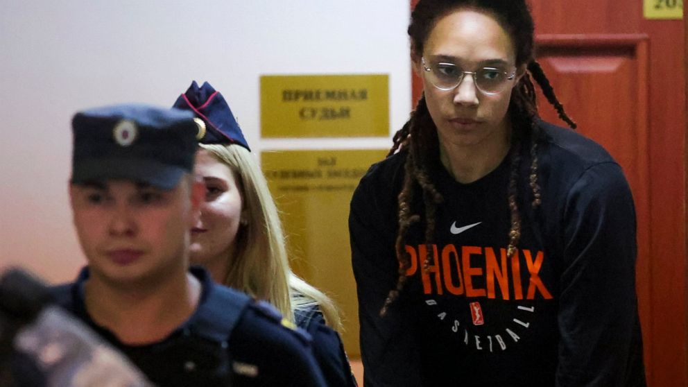 WNBA star and two-time Olympic gold medalist Brittney Griner is escorted to a courtroom for a hearing, in Khimki just outside Moscow, Russia, Wednesday, July 27, 2022. American basketball star Brittney Griner returned Wednesday to a Russian courtroom