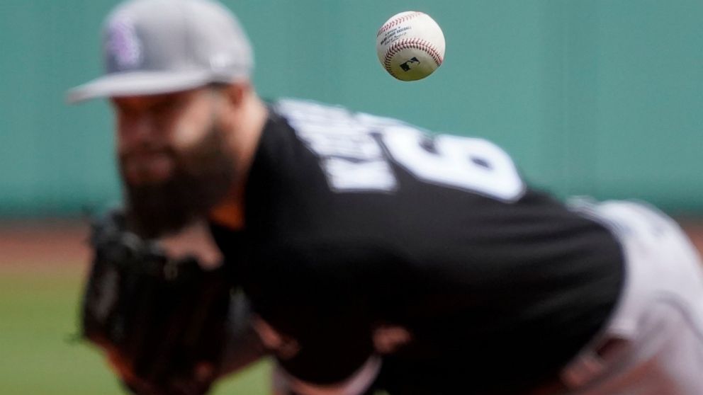 Chicago White Sox starting pitcher Dallas Keuchel (60) follows through on a pitch during the first inning of a baseball game against the Boston Red Sox at Fenway Park, Sunday, May 8, 2022, in Boston. (AP Photo/Mary Schwalm)