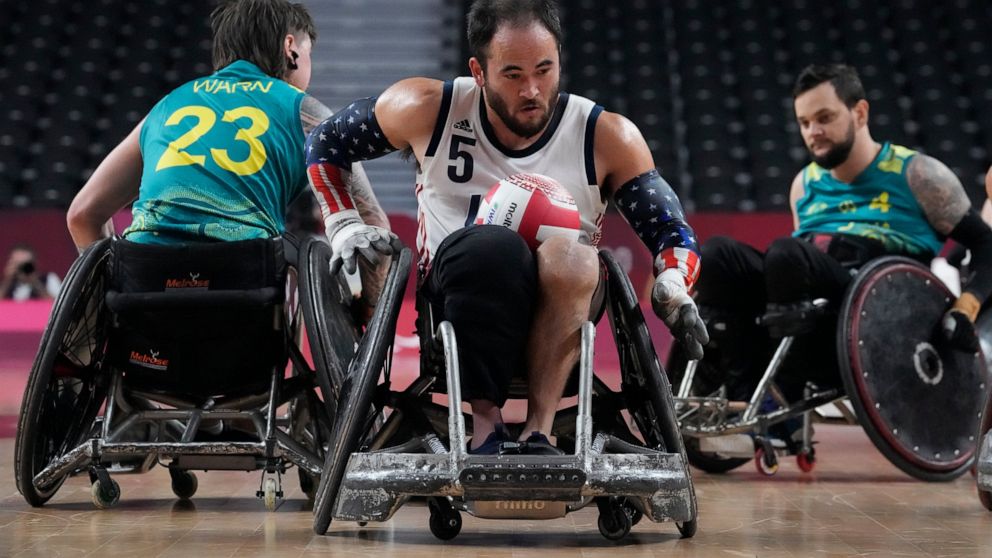 United States' Charles Aoki compete during a semifinal wheelchair rugby match against Australia at the Tokyo 2020 Paralympic Games, Saturday, Aug. 28, 2021, in Tokyo, Japan. (AP Photo/Kiichiro Sato)