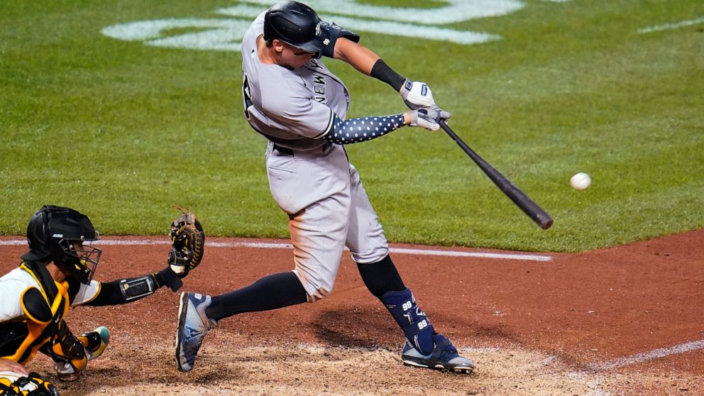 New York Yankees' Aaron Judge hits a grand slam off Pittsburgh Pirates relief pitcher Manny Banuelos during the eighth inning of a baseball game in Pittsburgh, Wednesday, July 6, 2022. (AP Photo/Gene J. Puskar)