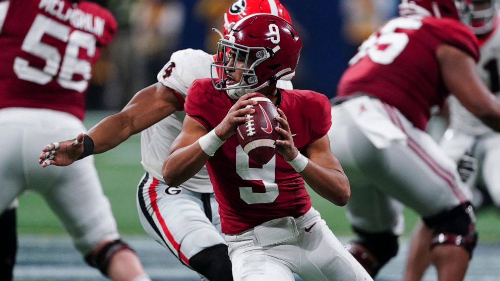 FILE - Alabama quarterback Bryce Young (9) works against Georgia during the second half of the Southeastern Conference championship NCAA college football game Dec. 4, 2021, in Atlanta. Alabama plays Georgia in the College Football Playoff national ch