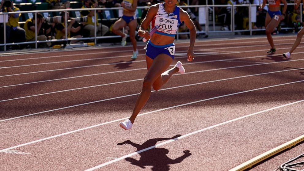 Allyson Felix, of the United States, runs in a heat of the women's 4x400-meter relay at the World Athletics Championships on Saturday, July 23, 2022, in Eugene, Ore. (AP Photo/Charlie Riedel)