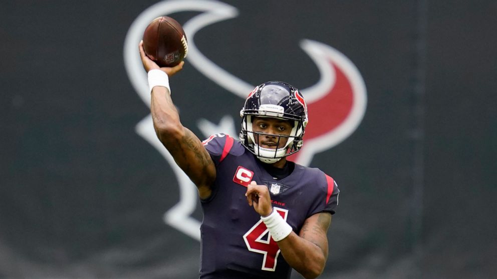 FILE - In this Dec. 27, 2020, file photo, Houston Texans quarterback Deshaun Watson throws a pass during an NFL football game against the Cincinnati Bengals in Houston. A person familiar with the decision tells AP quarterback Deshaun Watson has chang