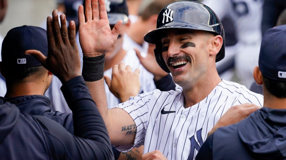 New York Yankees' Matt Carpenter celebrates after hitting a two-run home run in the sixth inning of a baseball game against the Chicago Cubs, Sunday, June 12, 2022, in New York. (AP Photo/Mary Altaffer)