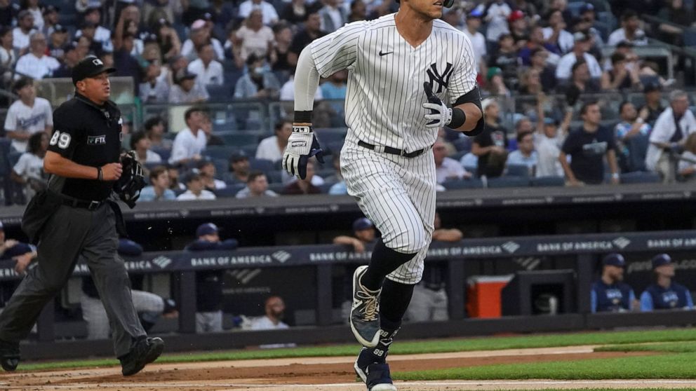 New York Yankees' Aaron Judge watches his home run in the first inning of the team's baseball game against the Tampa Bay Rays, Wednesday June 15, 2022, in New York. (AP Photo/Bebeto Matthews)