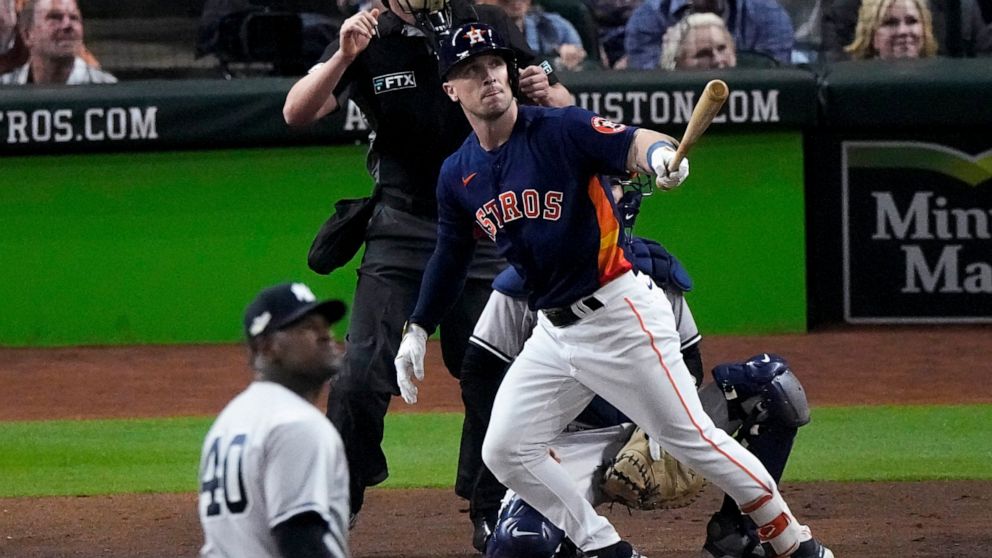 Houston Astros Alex Bregman (2) hits a solo homer during the third inning in Game 2 of baseball's American League Championship Series between the Houston Astros and the New York Yankees, Thursday, Oct. 20, 2022, in Houston. (AP Photo/Sue Ogrocki )