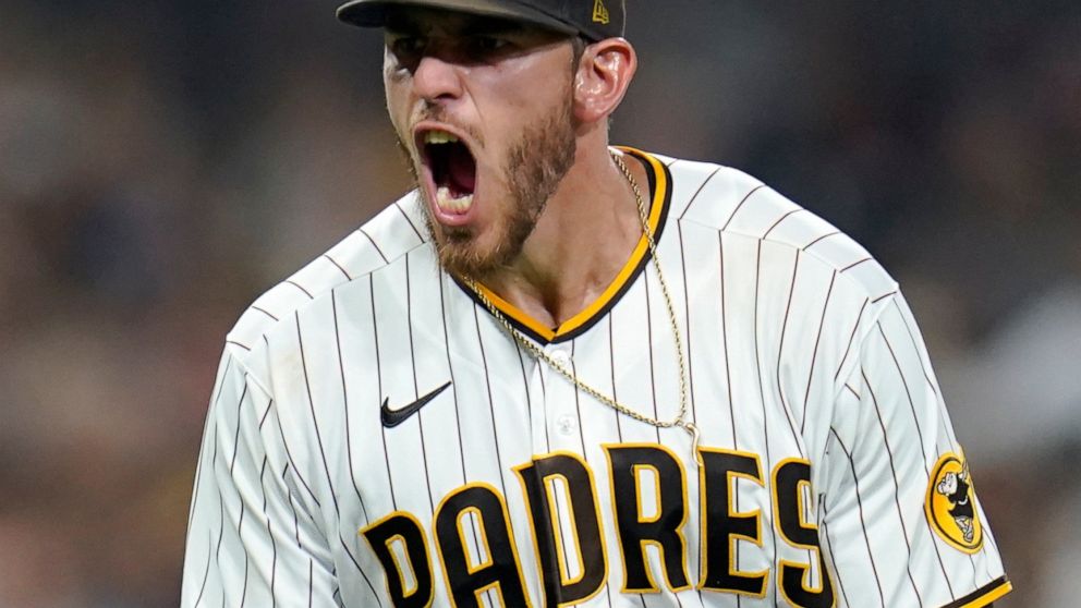 San Diego Padres starting pitcher Joe Musgrove reacts after getting the third out with the bases loaded during the fifth inning of the teams' baseball game against the Los Angeles Dodgers, Wednesday, Sept. 28, 2022, in San Diego. (AP Photo/Gregory Bull)