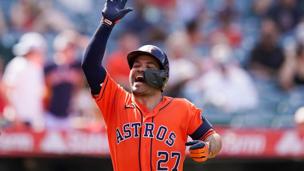 Houston Astros' Jose Altuve celebrates after his two-run home run during the seventh inning of a baseball game against the Los Angeles Angels, Sunday, Sept. 4, 2022, in Anaheim, Calif. (AP Photo/Jae C. Hong)