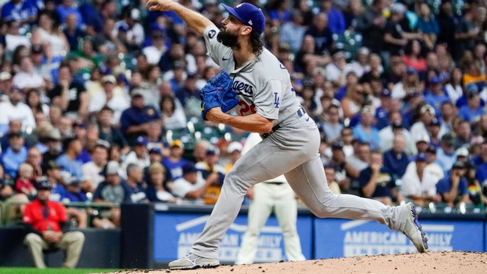 Los Angeles Dodgers starting pitcher Tony Gonsolin throws during the first inning of a baseball game against the Milwaukee Brewers Wednesday, Aug. 17, 2022, in Milwaukee. (AP Photo/Morry Gash)